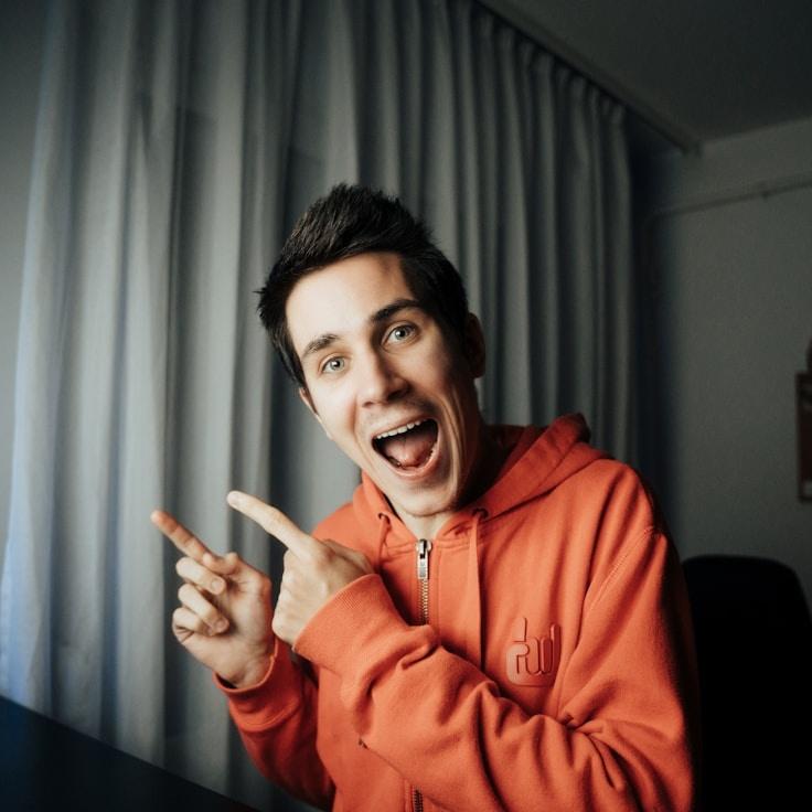 Kaveri Mehta, Lead Design Curator at ValleyStatioSage, reviewing corporate floral arrangements